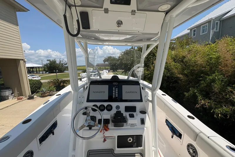 Slide: The Image of 2021 Sea Fox 268 Commander boat interior with Garmin navigation system and steering wheel. - 4