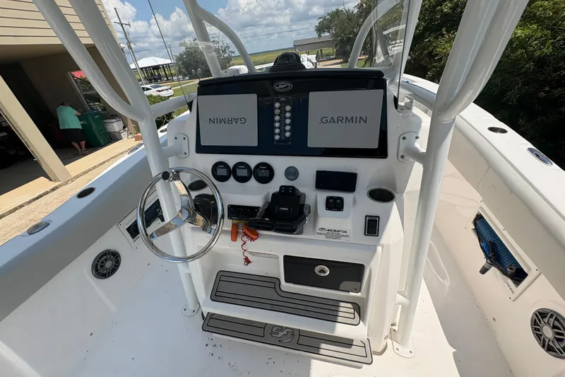 Slide: The Image of 2021 Sea Fox 268 Commander boat console with Garmin navigation system and steering wheel. - 6
