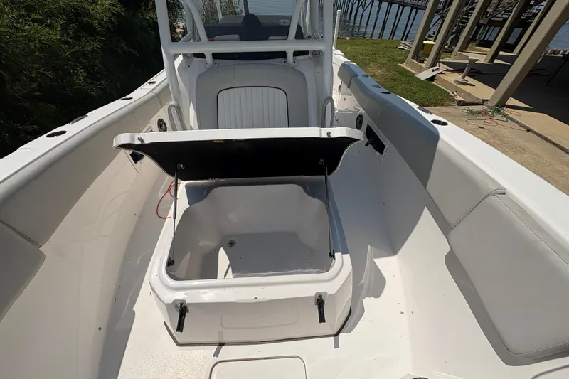 Slide: The Image of 2021 Sea Fox 268 Commander boat interior with open storage compartment. - 9