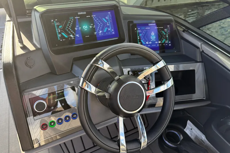 Slide: The Image of 2025 Avalon Excalibur Quad Lounge Windshield dashboard with advanced digital displays and steering wheel. - 31