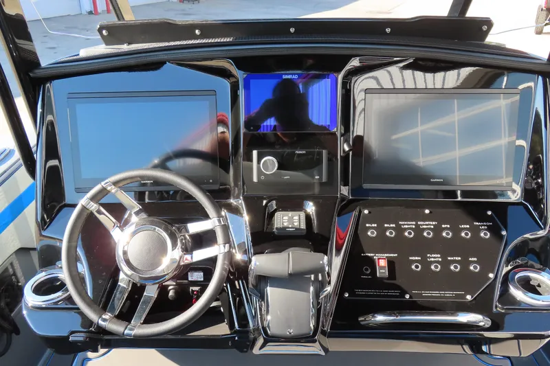 Slide: The Image of Dashboard of 2026 Sunsation 32 CCX boat with modern controls and displays. - 13
