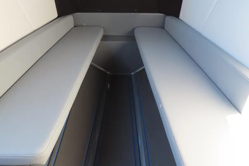 Slide: The Image of 2026 Sunsation 32 CCX interior seating with sleek gray upholstery. - 17