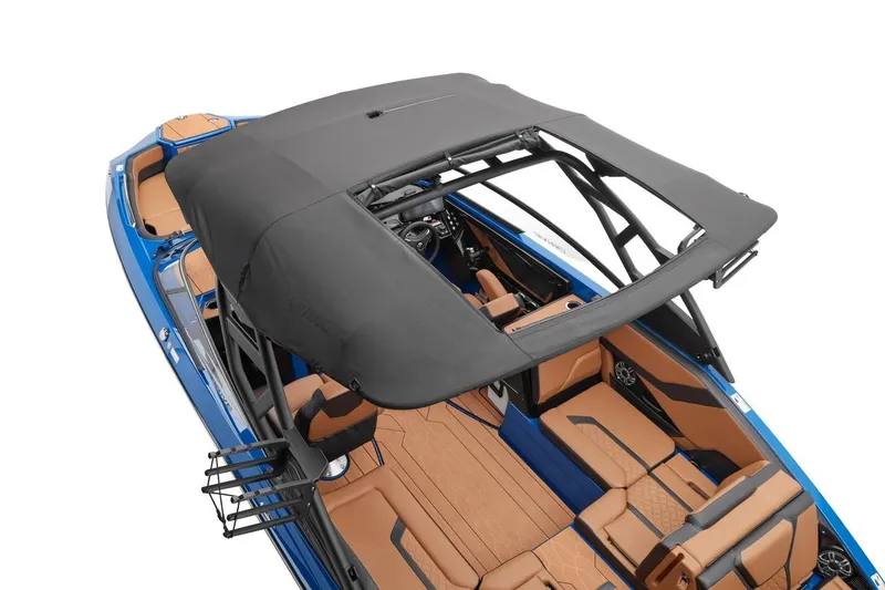 Slide: The Image of 2026 Yamaha Boats 255XD speaker with blue LED lighting under canopy. - 9