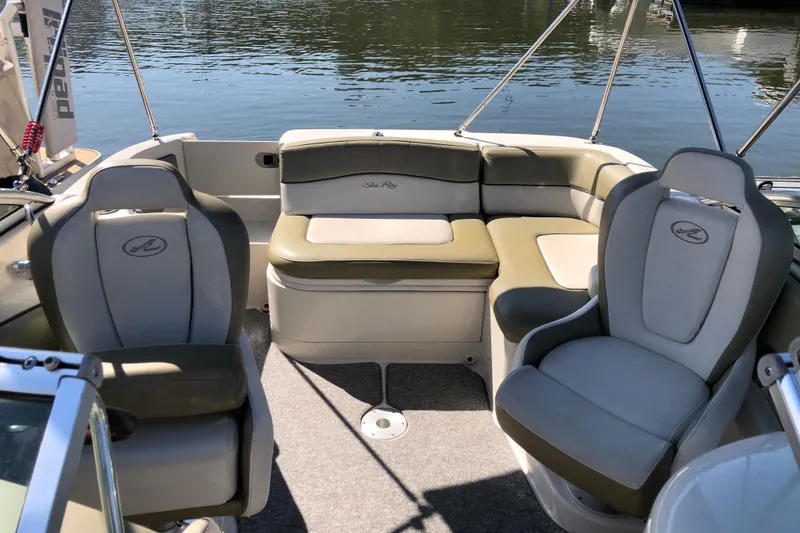 Slide: The Image of 2007 Sea Ray 220 Sundeck interior with comfortable seating and water view. - 5