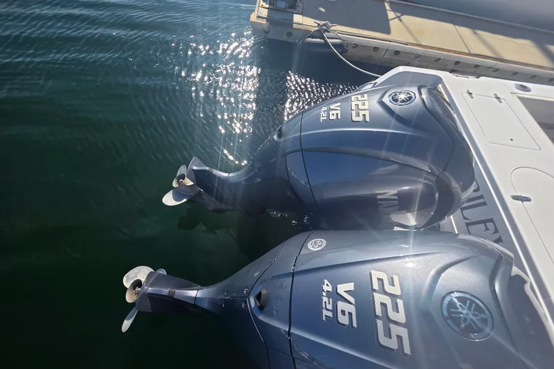 Slide: The Image of Twin Yamaha 225 V6 outboard engines on a 1990 Grady-White Marlin 280 boat. - 10