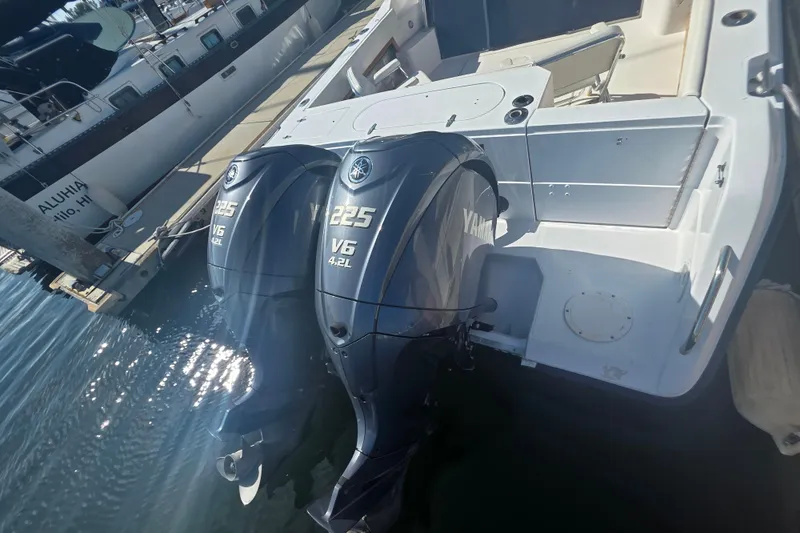 Slide: The Image of 1990 Grady-White Marlin 280 with twin Yamaha 225 V6 outboard engines docked. - 8