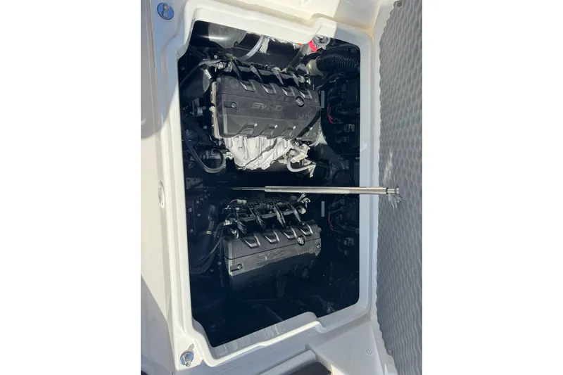 Slide: The Image of Manufacturer Provided Image: 2026 Yamaha Boats 255 FSH Sport H interior with seating and deck features. - 23