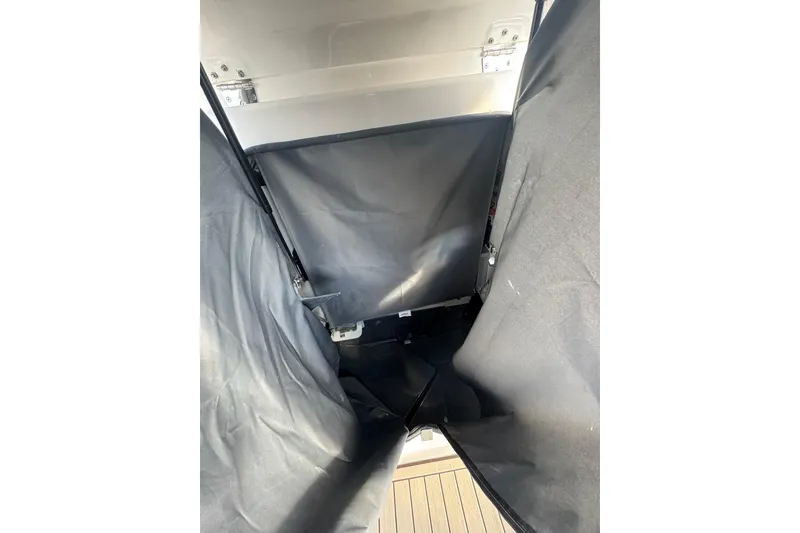 Slide: The Image of Interior view of 2026 Yamaha Boats 255 FSH Sport H storage compartment. - 27