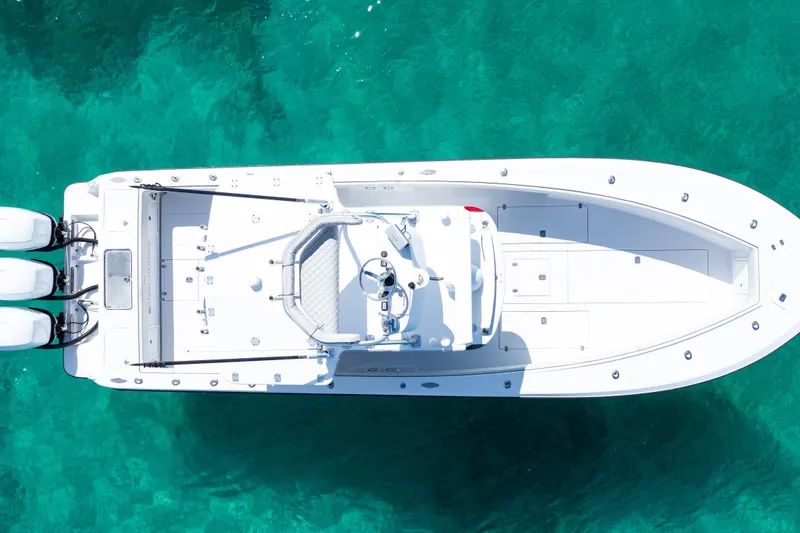 The Image of 2006 SeaVee 340B boat on clear blue ocean water under a bright sky. - 0