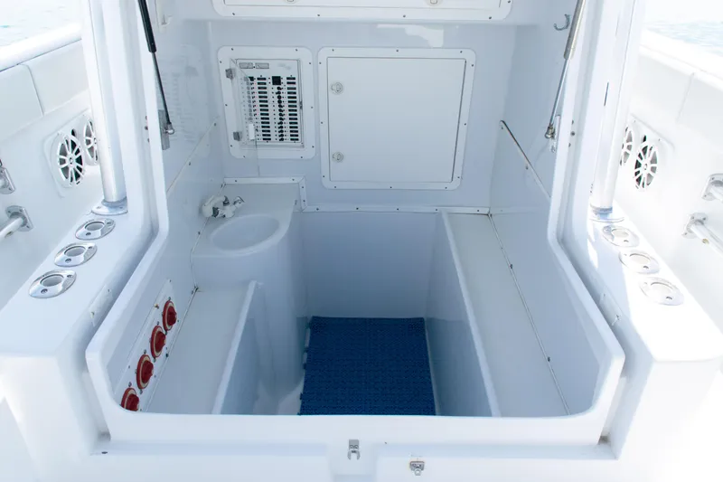 Slide: The Image of 2006 SeaVee 340B boat interior with sink, storage, and control panel. - 15