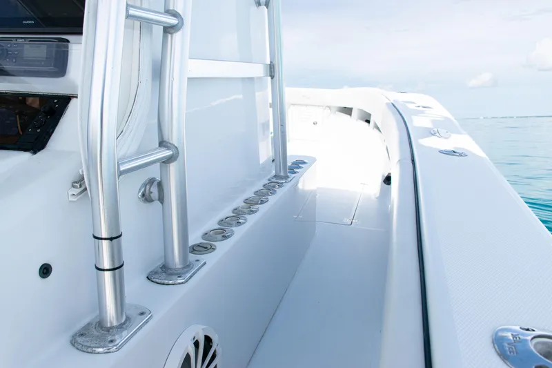 Slide: The Image of 2006 SeaVee 340B boat deck with rod holders and ocean view. - 23