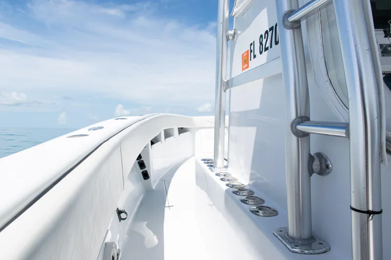 Slide: The Image of 2006 SeaVee 340B boat deck with clear sky and ocean view. - 25