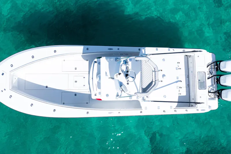 Slide: The Image of Overhead view of 2006 SeaVee 340B boat on clear turquoise water. - 45