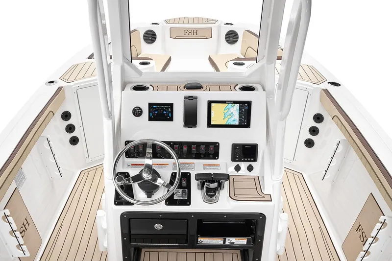 Slide: The Image of Manufacturer Provided Image: 2026 Yamaha Boats 222 FSH Sport E on a serene lake, people fishing. - 18