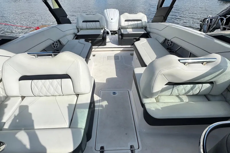 Slide: The Image of Luxurious interior of 2024 Regal LX6 boat with spacious seating and elegant design. - 12