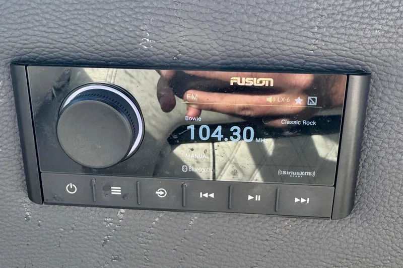 Slide: The Image of Fusion audio system in 2024 Regal LX6, displaying FM 104.30 MHz, Classic Rock. - 17