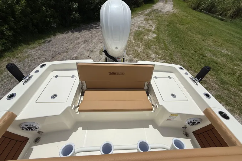 Slide: The Image of 2026 Pathfinder 2400 TRS boat interior with seating and storage compartments. - 24