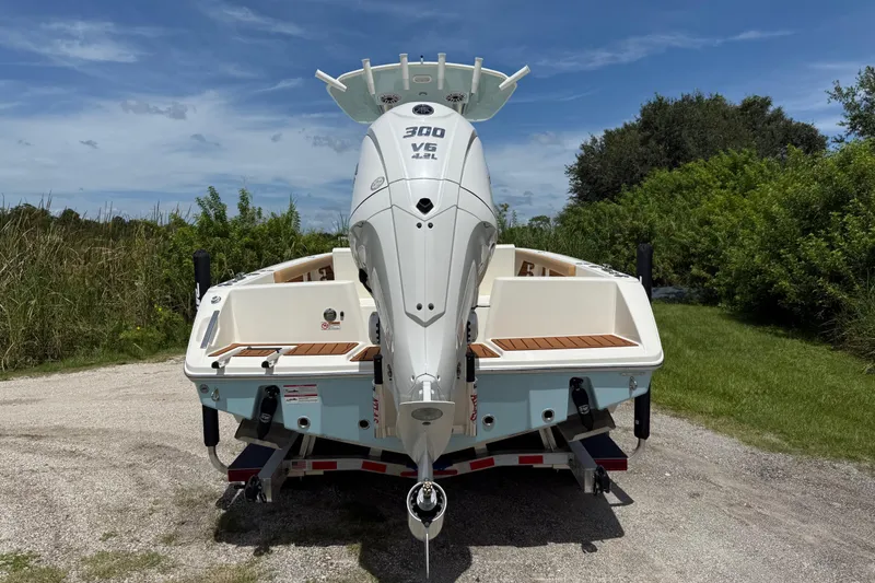 Slide: The Image of 2026 Pathfinder 2400 TRS boat with powerful V6 engine on a trailer. - 3