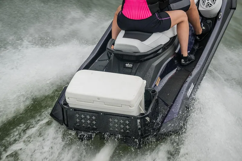 Slide: The Image of Manufacturer Provided Image: Person riding 2026 Yamaha WaveRunner VX Cruiser HO on water, wearing a pink life jacket. - 10