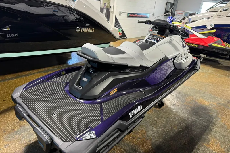 Slide: The Image of 2026 Yamaha WaveRunner VX Cruiser HO in showroom, sleek design, purple accents. - 6