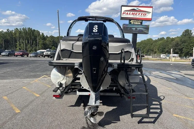 Slide: The Image of 2024 Bennington 25 QFBWA boat with powerful outboard motor at Palmetto Boat Center. - 5