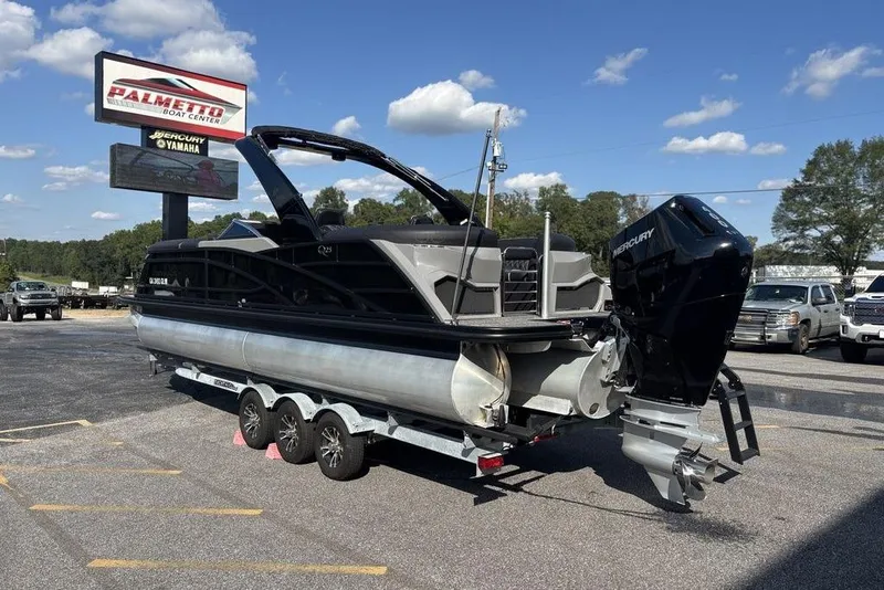 Slide: The Image of 2024 Bennington 25 QFBWA pontoon boat on trailer at Palmetto Boat Center. - 6