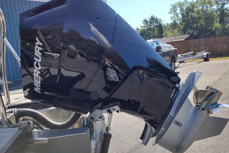 Slide: The Image of 2026 Tahoe Pontoon Grand Tahoe LTD with Mercury outboard motor in a sunny outdoor setting. - 14