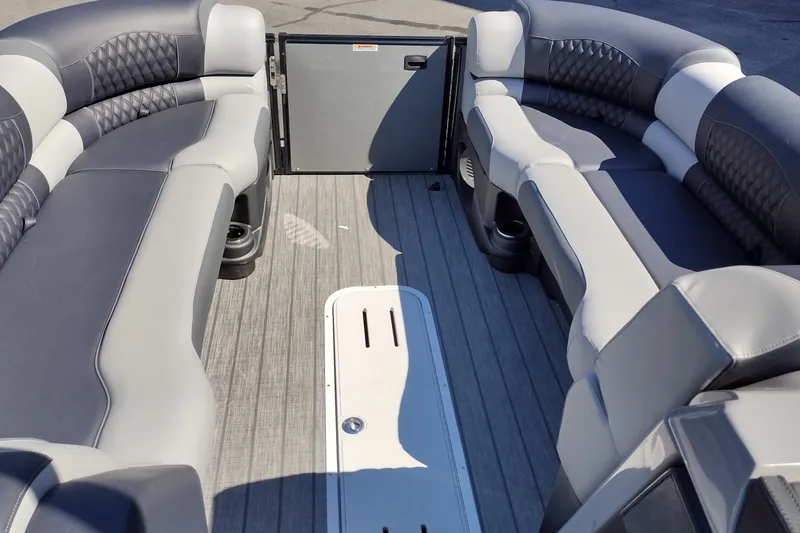Slide: The Image of 2026 Tahoe Pontoon Grand Tahoe LTD Cruise Rear Bench interior with luxurious seating. - 22