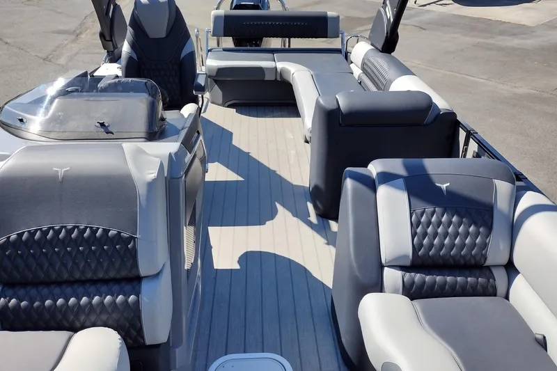 Slide: The Image of 2026 Tahoe Pontoon Grand Tahoe LTD Cruise Rear Bench with luxurious seating and modern design. - 25
