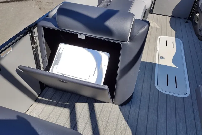 Slide: The Image of 2026 Tahoe Pontoon Grand Tahoe LTD Cruise Rear Bench with open storage compartment. - 26