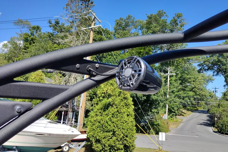 Slide: The Image of 2026 Tahoe Pontoon Grand Tahoe LTD Cruise Rear Bench with speaker detail. - 37