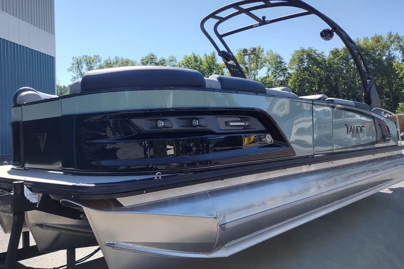Slide: The Image of 2026 Tahoe Pontoon Grand Tahoe LTD Cruise Rear Bench, sleek design, outdoor setting. - 4