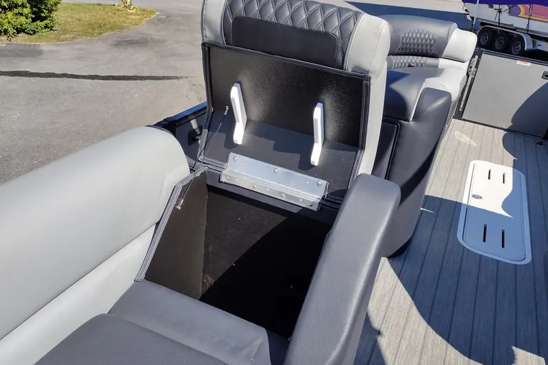 Slide: The Image of 2026 Tahoe Pontoon Grand Tahoe LTD Cruise Rear Bench with open storage compartment. - 41