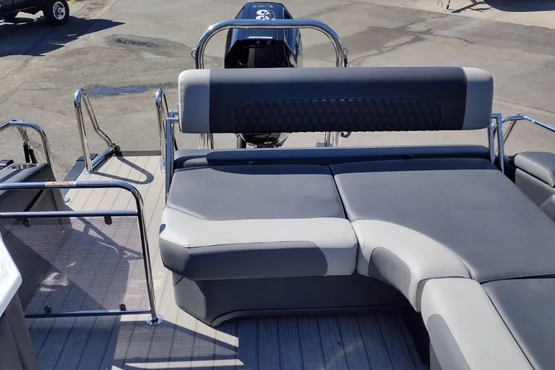 Slide: The Image of 2026 Tahoe Pontoon Grand Tahoe LTD Cruise Rear Bench with sleek gray seating. - 44