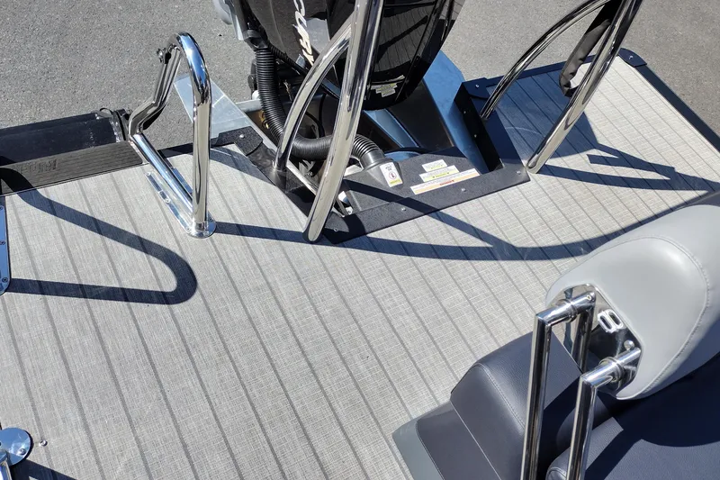 Slide: The Image of 2026 Tahoe Pontoon Grand Tahoe LTD Cruise Rear Bench with sleek deck and engine view. - 45