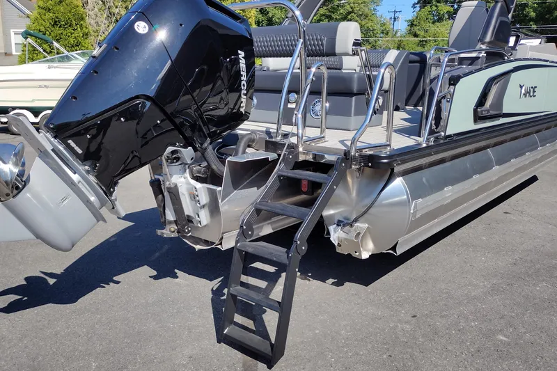 Slide: The Image of 2026 Tahoe Pontoon Grand Tahoe LTD Cruise Rear Bench with Mercury outboard motor. - 48