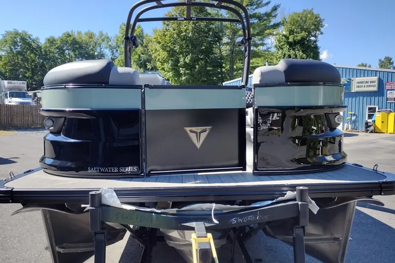 Slide: The Image of 2026 Tahoe Pontoon Grand Tahoe LTD Cruise Rear Bench, Saltwater Series, parked outdoors. - 5
