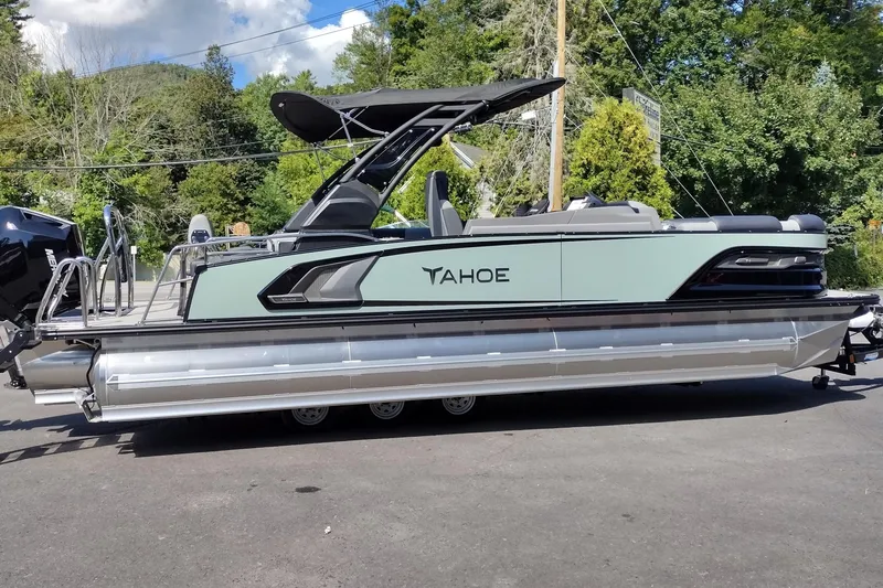 Slide: The Image of 2026 Tahoe Pontoon Grand Tahoe LTD Cruise Rear Bench on display outdoors. - 50
