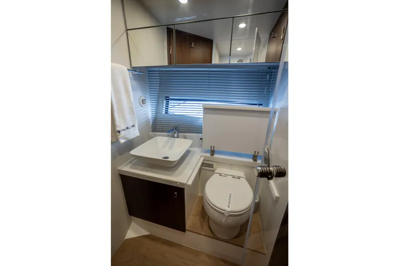 Slide: The Image of Modern bathroom in 2025 Fairline Squadron 50 yacht with sleek fixtures and elegant design. - 14