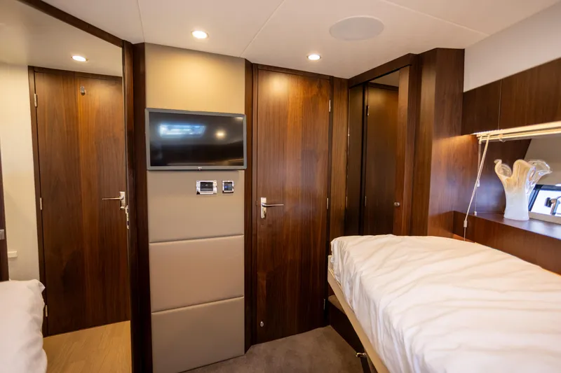 Slide: The Image of Luxurious cabin interior of 2025 Fairline Squadron 50 yacht with modern amenities. - 25