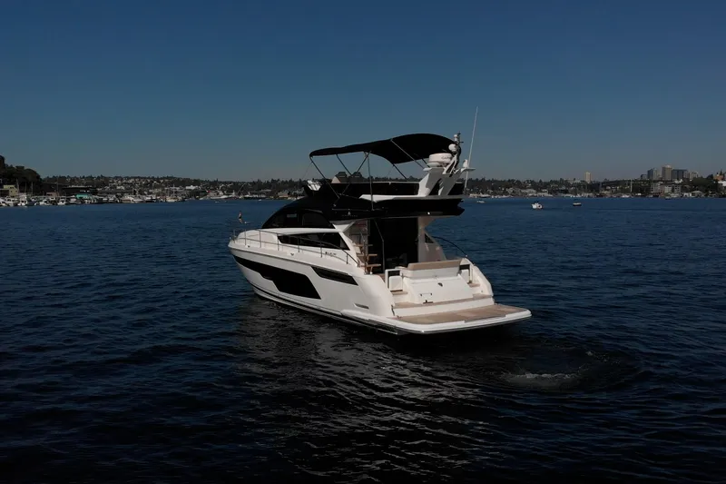 Slide: The Image of 2025 Fairline Squadron 50 yacht cruising on a calm, sunny day. - 37