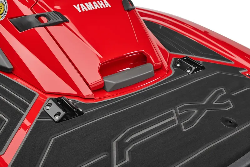 Slide: The Image of Manufacturer Provided Image: 2026 Yamaha WaveRunner FX Cruiser HO storage compartment, open view, red and black design. - 11
