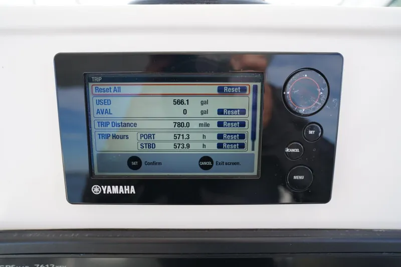 Slide: The Image of Yamaha display on 2016 Edgewater 280 CX showing trip data and fuel usage. - 24