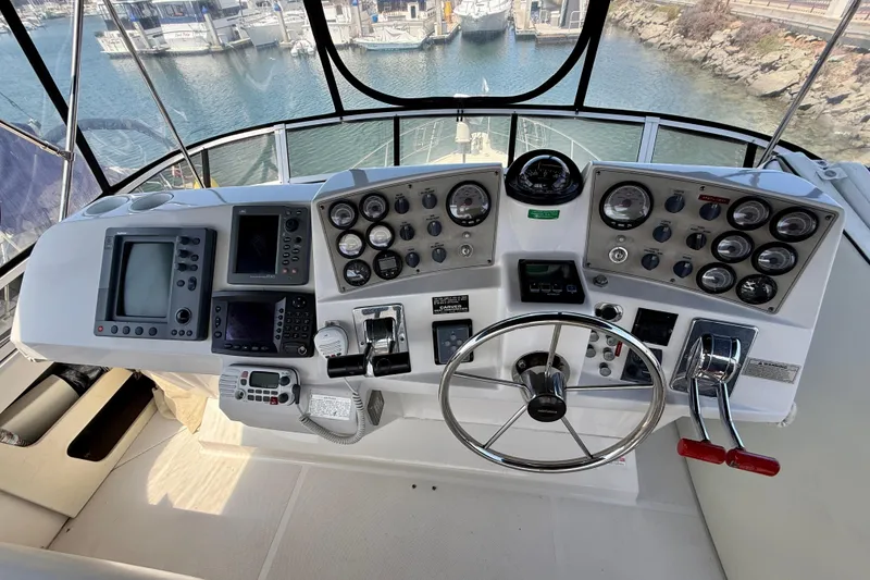 Slide: The Image of Control panel of a 2000 Carver 356 Aft Cabin Motor Yacht with navigation instruments. - 11