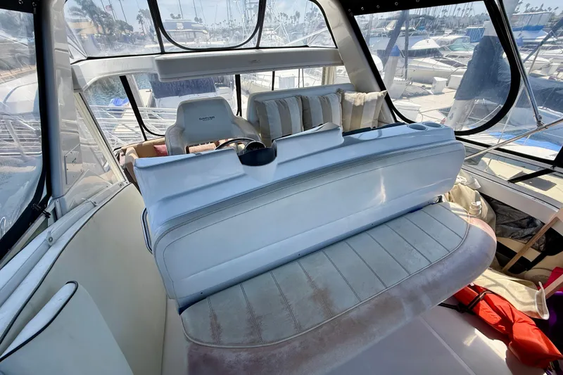 Slide: The Image of Interior of 2000 Carver 356 Aft Cabin Motor Yacht with seating and helm view. - 12