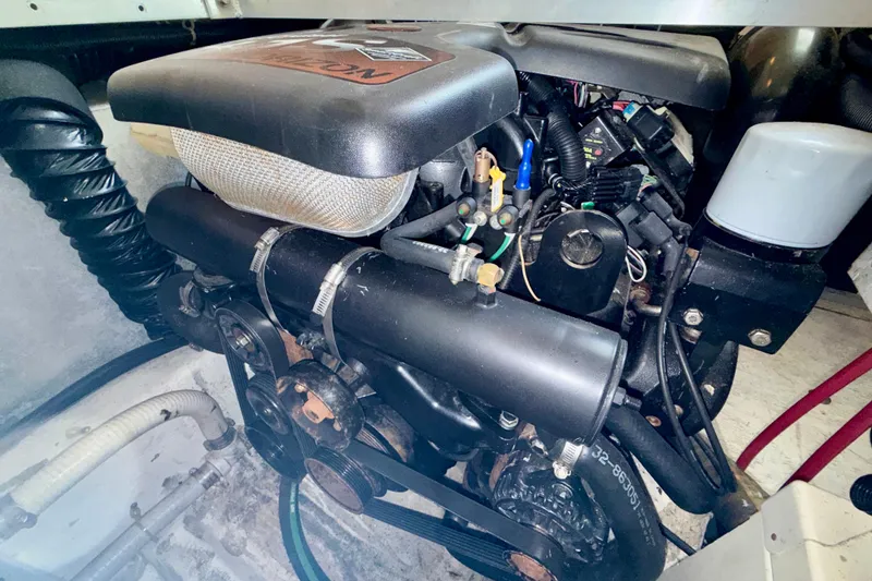 Slide: The Image of Engine compartment of 2000 Carver 356 Aft Cabin Motor Yacht, showcasing mechanical components. - 31