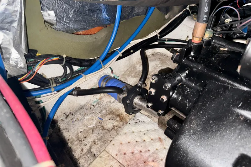 Slide: The Image of Engine compartment of 2000 Carver 356 Aft Cabin Motor Yacht with visible wiring and components. - 37