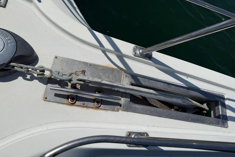 Slide: The Image of Anchor chain mechanism on 2000 Carver 356 Aft Cabin Motor Yacht deck. - 39