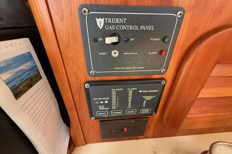 Slide: The Image of Trident gas control panel on 2001 Hinckley Classic Picnic Boat interior. - 62