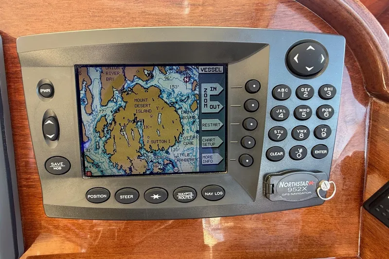 Slide: The Image of Navigation system on 2001 Hinckley Classic Picnic Boat, displaying Mount Desert Island map. - 33